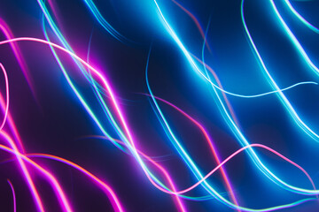 Neon blue and pink led lines on a dark night background. Kaleidoscope futuristic backdrop.