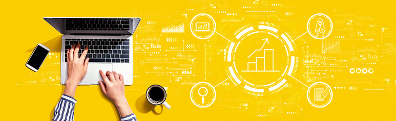 Business growth analysis with person using a laptop computer