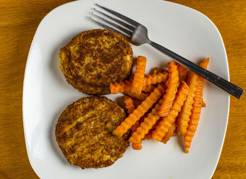 crab cakes with a side sweet poto fries