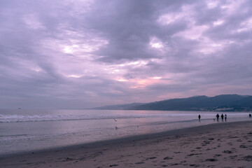 California Sunset on the beach in Santa Monica looking at the hills of Malibu. 