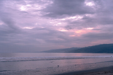 California Sunset on the beach in Santa Monica looking at the hills of Malibu. 