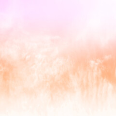 Orange sky with Soft clouds. Fantasy magical sunny sky pastel background is fluffy white cloud. Freedom wallpaper concept. Sweet color dream. 
