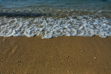 gentle waves on the coast of a beach in Indonesia
