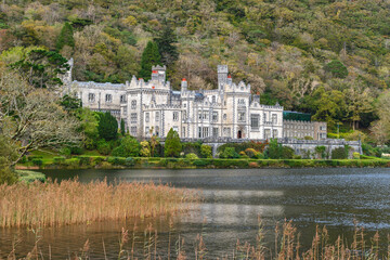 Landscape view with Kylemore Abbey Old Church famous Irish landmark Galway Ireland