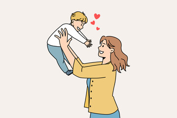 Happy parenthood and motherhood concept. Smiling young woman mother standing and holding her small baby boy reaching for her feeling love vector illustration 