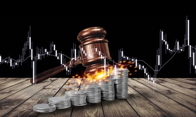 Old wood Judge hammer with stacking coins, Used for adjudication and Justice.