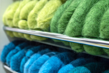 Skeins of yarn on a shelf
