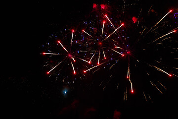 Very beautiful fireworks against the black sky. Graphic resource for design. Underlay or undercoat