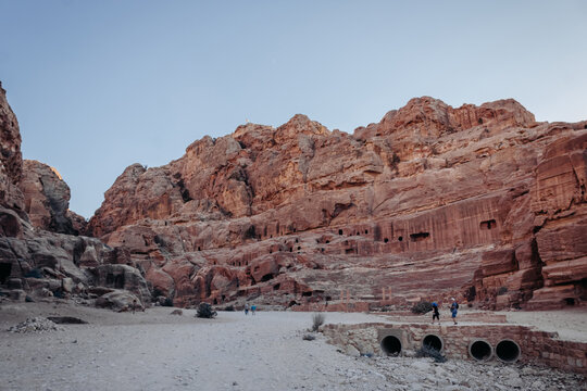 Landscape of Petra. Sunset. Top view of the red mountains and the ruins of Petra. Jordan. Colorful photos. Tourist in Petra