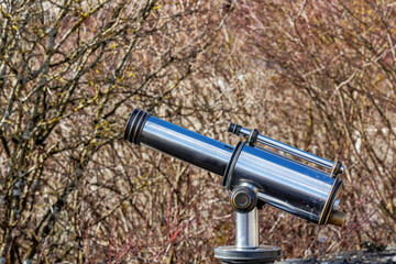 Fixed shiny metal binoculars at a viewpoint near Zeil Castle near Leutkirch in the Allgäu region...
