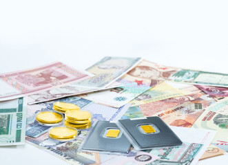 Various currencies. Banknotes, money, gold bars from different countries. Diversification of the investment portfolio. Investing in financial instruments, saving. Inflation, exchange rates.