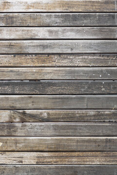 Background of rustic wooden slats arranged horizontally.
