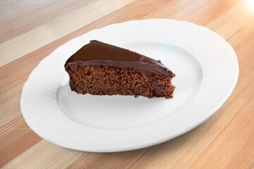 Honey cake slice on white plate