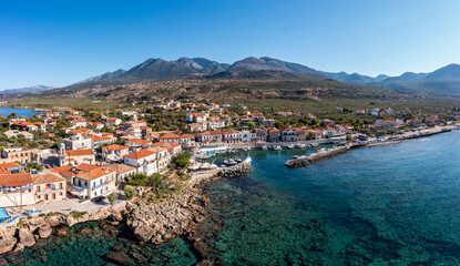 Naklejka na ściany i meble Greece Peloponnese. Mani, Agios Nikolaos traditional fishing village and port, aerial view