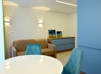 KALININGRAD, RUSSIA - JANUARY 09, 2022: A fragment of the interior of the living room with a round table