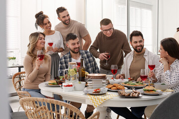 Group of people having brunch together indoors