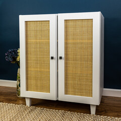 Gray simple furniture with rattan doors boho style