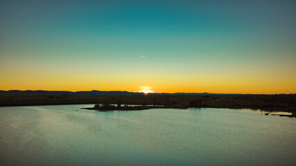 ATARDECER SOBRE EL PANTANO DE ARROYO DE LA LUZ CACERES