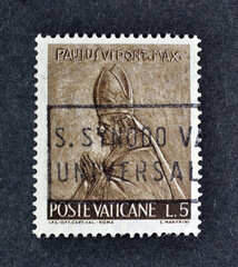 cancelled postage stamp printed by Vatican, that shows Pope Paul VI , circa 1966.