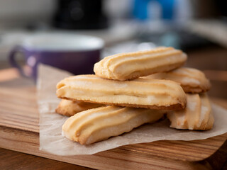 Fototapeta na wymiar Long sticks shortbread with nice ridges. Buttery biscuits Viennese fingers. Perfect companion to a cup of tea or coffee
