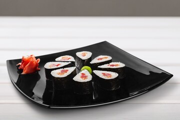 Tasty fresh sushi roll on the desk