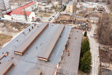 The roof of the old industrial plant building in Kiev. Aerial drone view.