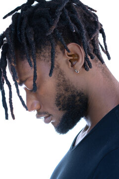 A profile portrait of an African American man.