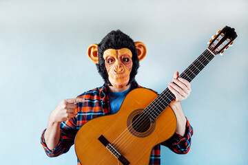 Monkey with a Spanish guitar.