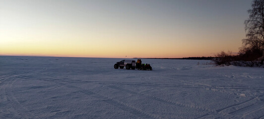 Winter trip on the frozen lake Peipus. A popular holiday destination, many tourists come by car on the ice.