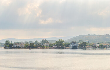 Evia island, Greece - June 30. 2020: Anchored ferry in the port of Edipsos - Greece.