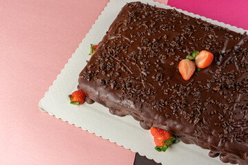 chocolate cake with strawberry and sprinkles