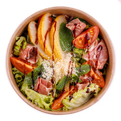 salad with ham pear tomato on white background for restaurant website