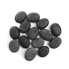 black spa stones isolated on white background .