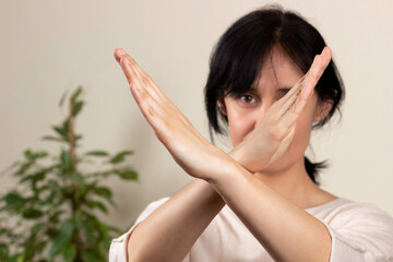 Crossed hands. Break the bias symbol of woman's international day. Woman arms crossed to show...