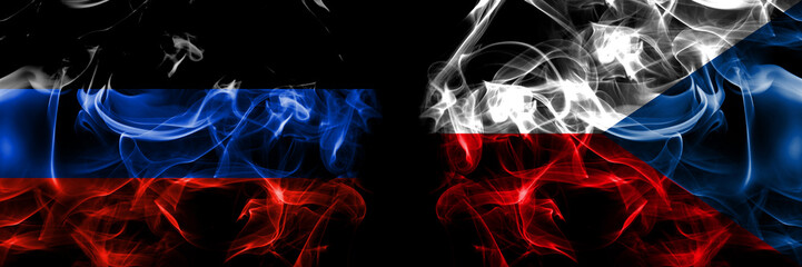 Donetsk People's Republic vs Czech Republic flag. Smoke flags placed side by side isolated on black background.