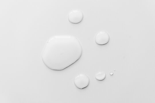 Water drops on white background, top view - Image