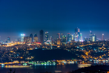Fototapeta na wymiar Istanbul night view. Skyscrapers, hotels and modern office buildings. Istanbul, Turkey.