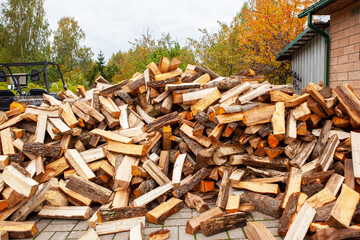 Stock of firewood for heating the house.