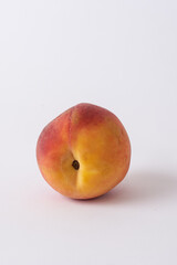 fresh peach on a white meza