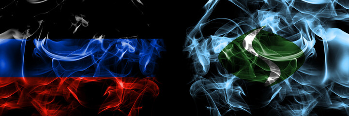 Donetsk People's Republic vs Japan, Japanese, Shiriuchi, Hokkaido, Oshima, Subprefecture flag. Smoke flags placed side by side isolated on black background.