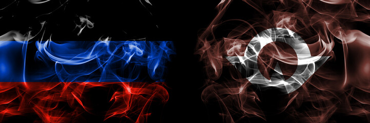 Donetsk People's Republic vs Japan, Japanese, Yamaguchi Prefecture flag. Smoke flags placed side by side isolated on black background.