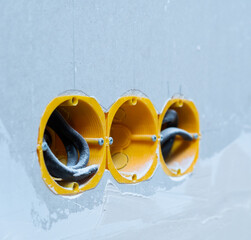 
wires sticking out of the wall. electrical wiring repair