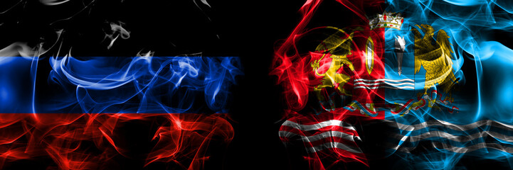 Obraz premium Donetsk People's Republic vs Russia, Russian, Ivanovo Oblast flag. Smoke flags placed side by side isolated on black background.
