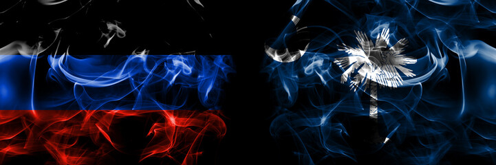 Donetsk People's Republic vs South Carolina flag. Smoke flags placed side by side isolated on black background.