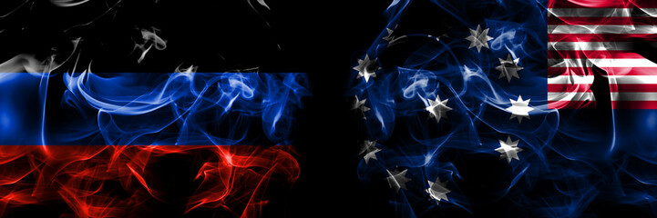 Donetsk People's Republic vs United States of America, America, US, USA, American, Easton, Pennsylvania flag. Smoke flags placed side by side isolated on black background.