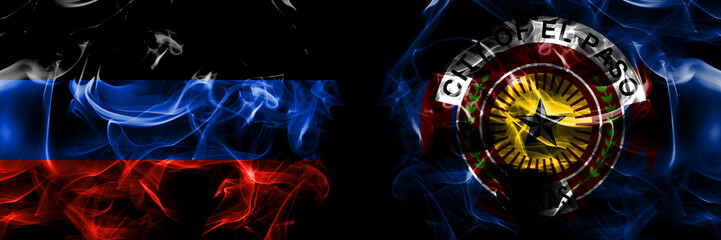 Donetsk People's Republic vs United States of America, America, US, USA, American, El Paso, Texas flag. Smoke flags placed side by side isolated on black background.