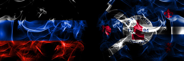 Donetsk People's Republic vs United States of America, America, US, USA, American, Fort Wayne, Indiana flag. Smoke flags placed side by side isolated on black background.
