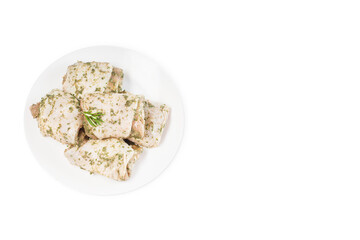 Raw chicken thighs in spicy herbs.Raw chicken thighs for barbecue in sauce, semi-cooked food.