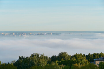 Fog over the city in the morning. Autumn morning fog.