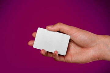 Obraz premium A female hand hold mockup Bank credit card with online service